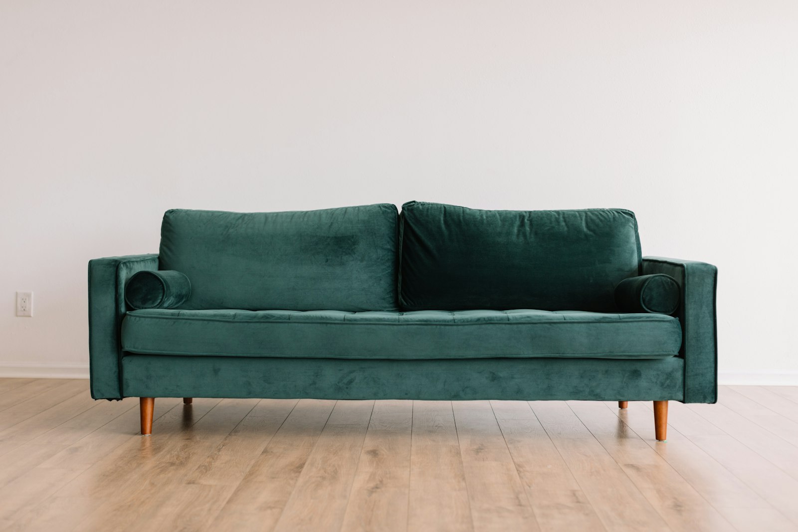 Forest green velvet three-seat sofa