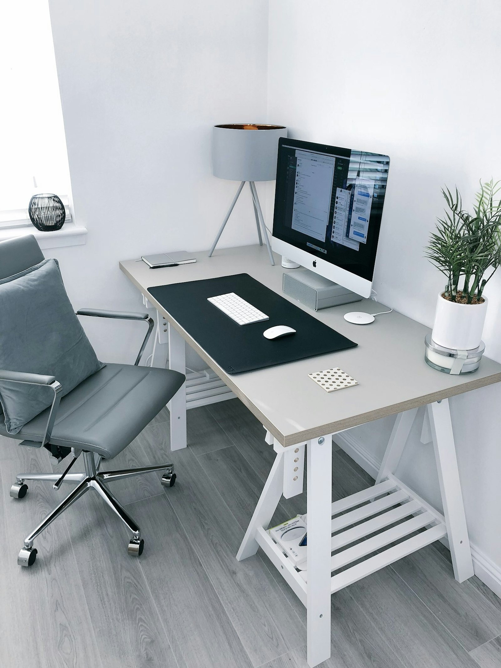 White oak height-adjustable desk in a bright home office
