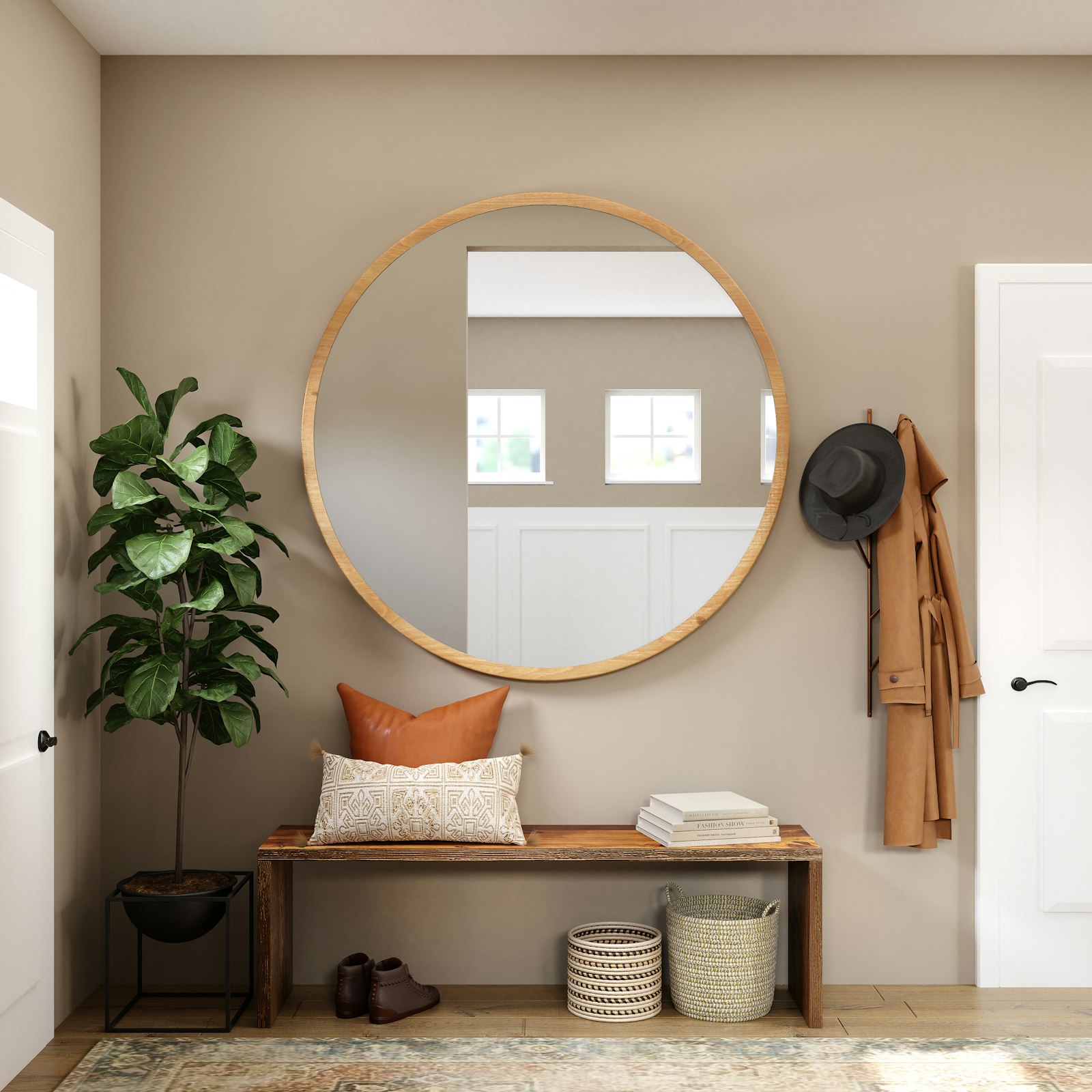 Arched brass mirror above an entryway bench